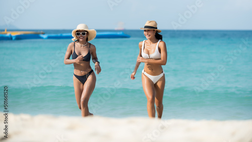 couple in bikini on the beach