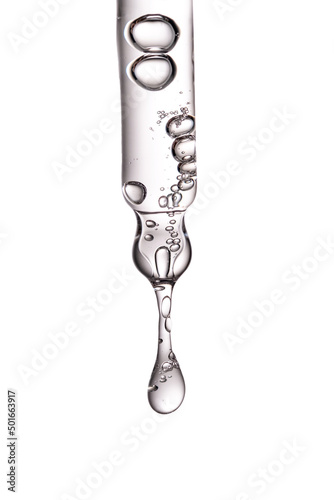 Pipette with serum, gel, oil or other cosmetic product. photo
