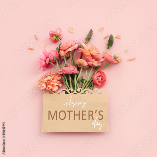 Tableau sur toile mother's day concept with pink flowers over pastel background