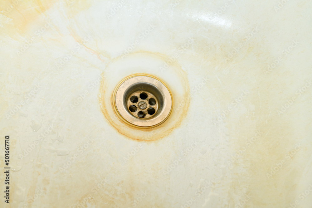 Dirty and rusty sink close-up. The concept of cleanliness and hygiene Dirty and rusty sink close-up. The concept of cleanliness and hygiene