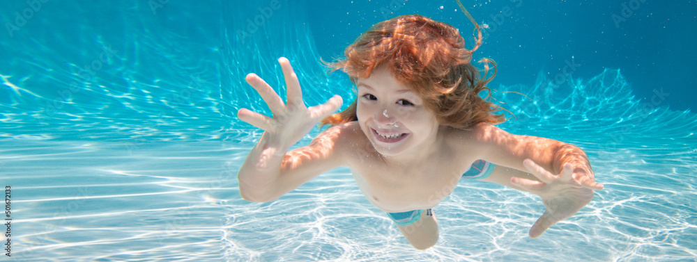 Child underwater. Funny face portrait of child boy swimming and diving underwater with fun in pool. Banner for header, copy space. Poster for web design. - obrazy, fototapety, plakaty 