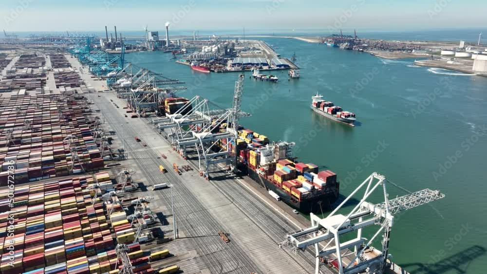 Container terminal logistic ship loading and unloading of import and export dock commercial harbour aerial drone view. freight business