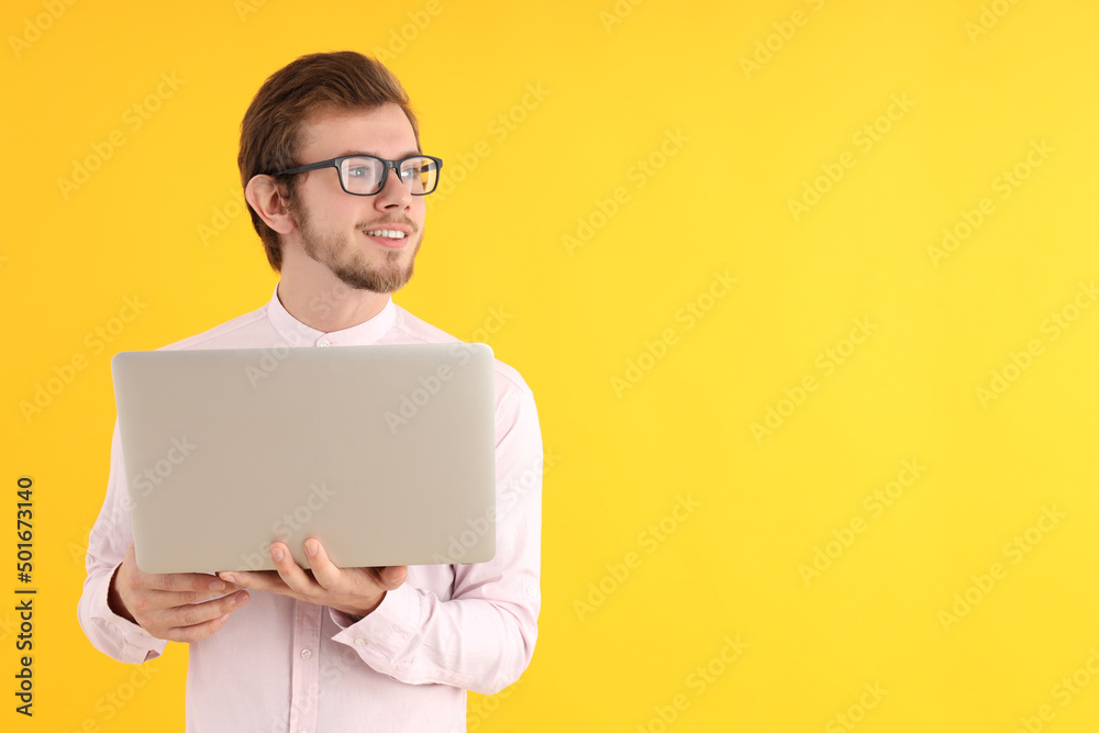 Concept of people with young man on yellow background Concept of people with young man on yellow background