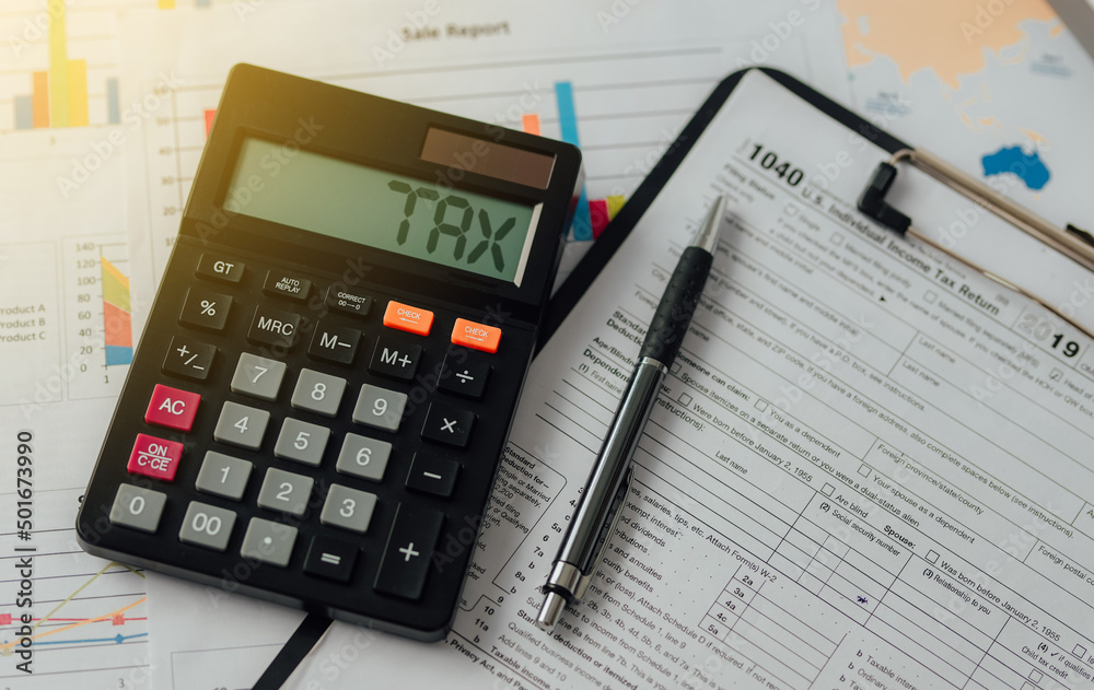 Tax words and numbers 2022 on the calculator Business and tax ideas. Pay taxes in 2022. New year 2022 tax ideas. Tax words and numbers 2022 on the calculator Business and tax ideas. Pay taxes in 2022. New year 2022 tax ideas.