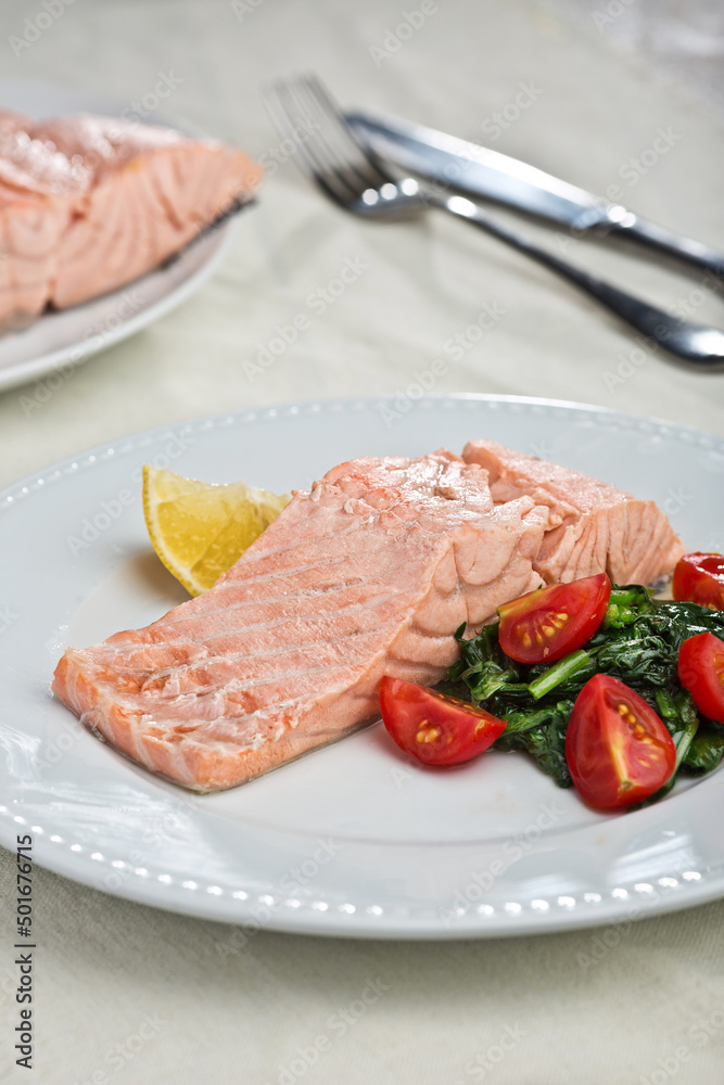 Fried red fish, Ukrainian cuisine. Photo of food on a white background Fried red fish, Ukrainian cuisine. Photo of food on a white background
