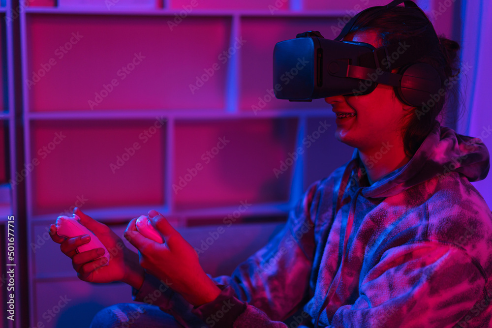 Metaverse technology concept, Man playing games with virtual reality goggles in metaverse Metaverse technology concept, Man playing games with virtual reality goggles in metaverse