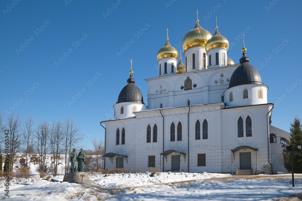 Dmitrov, Russia - March 18, 2022: Assumption Cathedral and the monument to Cyril and Methodius in the Dmitrov Kremlin Dmitrov, Russia - March 18, 2022: Assumption Cathedral and the monument to Cyril and Methodius in the Dmitrov Kremlin