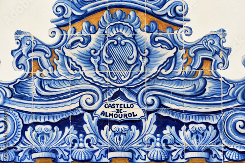 detail of the decoration in azulejos tiles around the windows on the facade of old railways station in Aveiro, Portugal