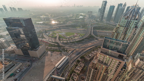 Dubai marina and JLT skyscrapers along Sheikh Zayed Road aerial timelapse.