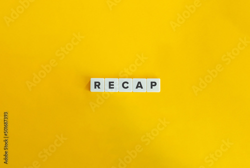 Recap Word on Letter Tiles on Yellow Background. Minimal Aesthetics. photo