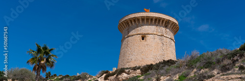 El Campello tower landmark tourist attraction between Benidorm and Alicante Spain with blue sky photo
