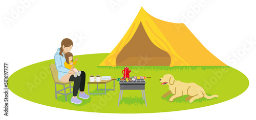 Mother and daughter enjoying camp with a dog - Spring or Autumn