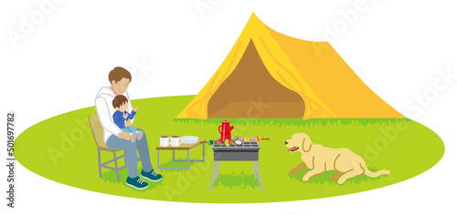 Father and son enjoying camp with a dog - Spring or Autumn