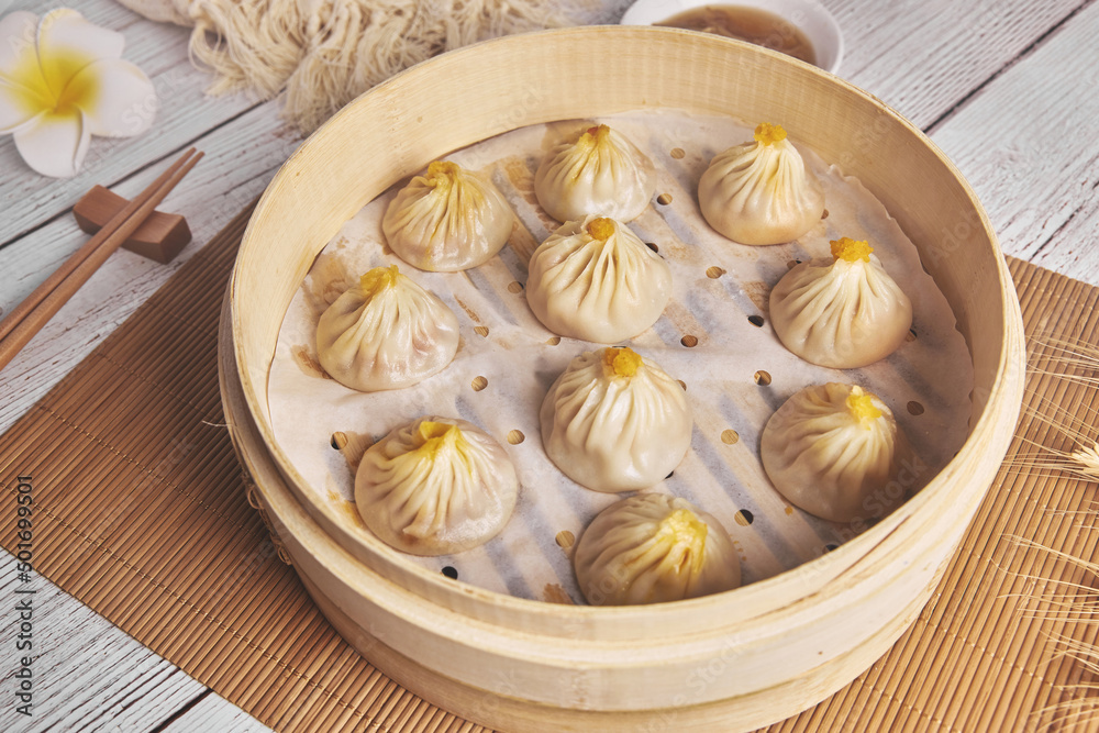 Chinese steamed Buns or Xiaolongbao with crab meat and roe. Chinese steamed Buns or Xiaolongbao with crab meat and roe.