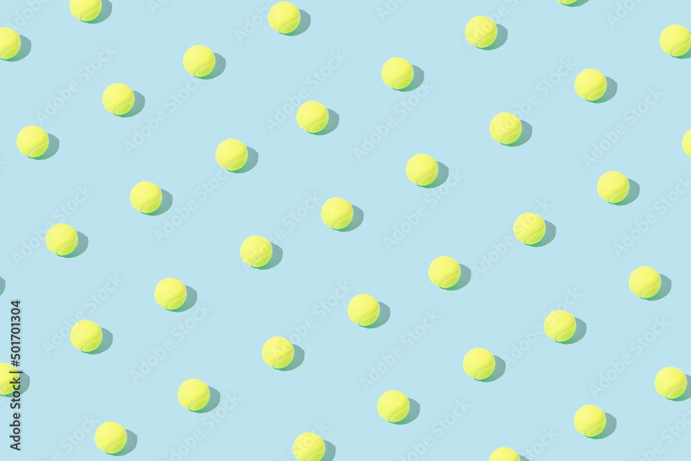 Pattern made of yellow tennis balls. Minimal concept.