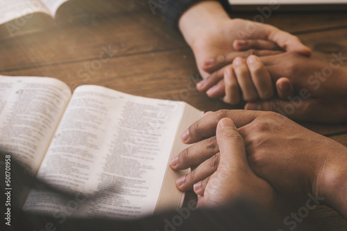 Group of different women praying together, Christians and Bible study. Begging for forgiveness and believe in goodness. Christian life crisis prayer to god. .