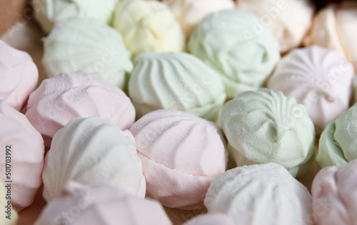 Fresh multicolored marshmallow lies in cardboard packaging prepared for sale in stores