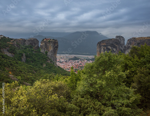 Panoramic view of Mount Meteor and the religious monastery of Greece with unusual clouds in the sky