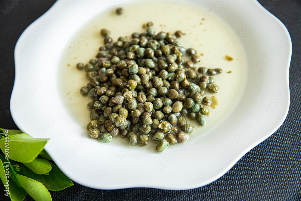 capers marinated for sauce fresh healthy meal food snack diet on the table copy space food background rustic top view capers marinated for sauce fresh healthy meal food snack diet on the table copy space food background rustic top view