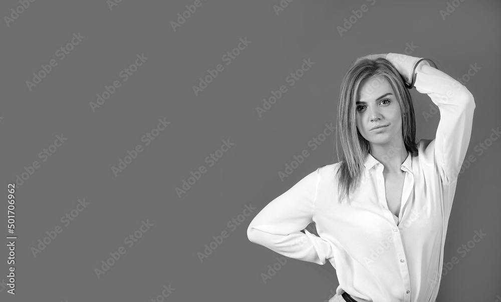 Beautiful young blonde girl with trendy accessories posing in studio. Perfect make-up. Beautiful young blonde girl with trendy accessories posing in studio. Perfect make-up.