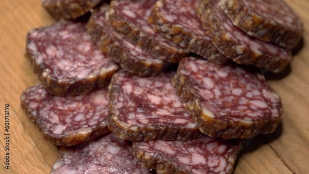 Pieces of sausage on a rotating surface. 4k video Pieces of sausage on a rotating surface. 4k video