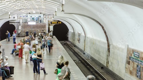 An underground train departing from Defenders of Ukraine metro station on Oleksievska Line of Kharkiv metro timelapse