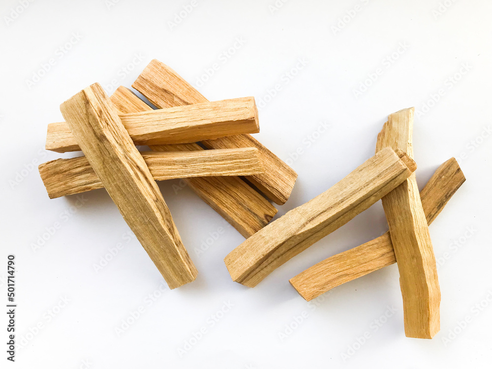 Set of palo santo sticks, natural incense from Peru. Religious background, place for text Set of palo santo sticks, natural incense from Peru. Religious background, place for text