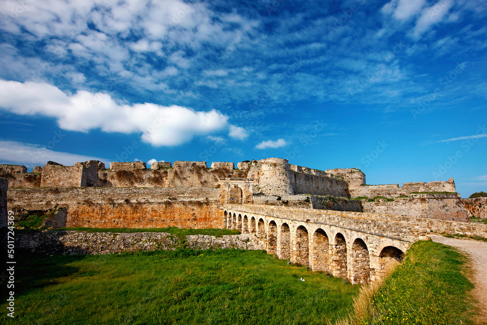 MESSENIA, GREECE.
The stone bridge that crosses the ditch and leads to the Venetian castle of Methoni, Peloponnese.