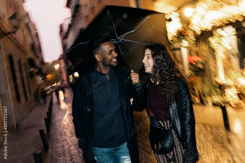 Interracial Couple Under the Rain