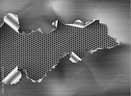 ragged Hole torn in ripped metal on steel background