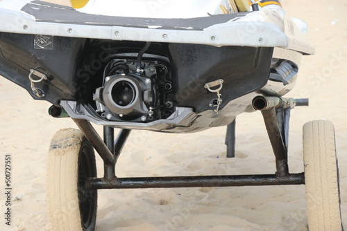 Trailer with jetski or known as beachside water scooters with the view of its propulsion part on a sunny day