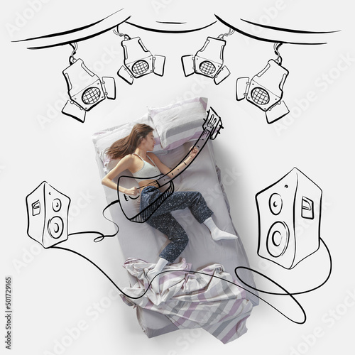 Creative image. Top view of young woman lying on bed, sleeping, dreaming about beign rock musician, playing on stage photo