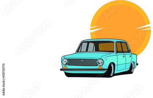 blue classic car on the background of the sun