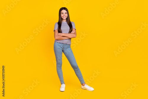 Full length body size view of attractive slim cheerful girl folded arms copy space isolated over bright blue color background
