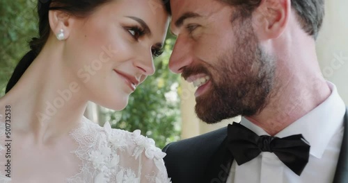Young couple poses for wedding photoshoot in Isola Del Garda