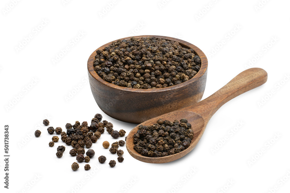Black pepper seeds in wooden cup on white background, healthy food concept. Black pepper seeds in wooden cup on white background, healthy food concept.