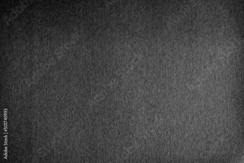 Old Dark black grainy kraft paper background texture