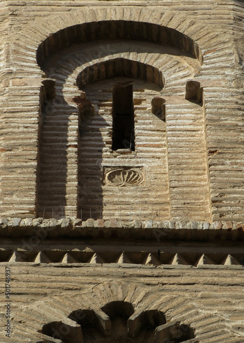 Church of San Bartolome. Historic city of Toledo. Spain.
Detail of window and decoration with brick arches in the apse. Islamic Mudejar art of the 12-13 century.
UNESCO World Heritage. photo