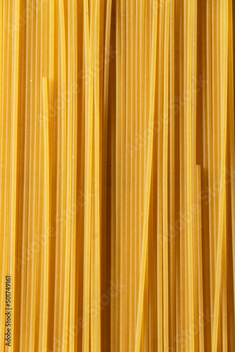 Close up of raw spaghetti pasta, food backgrounds, organic ingredients