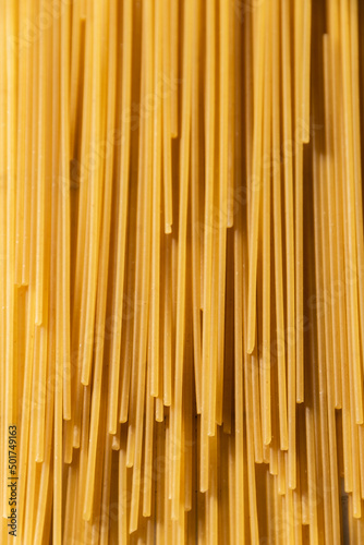 Close up of raw spaghetti pasta, food backgrounds, organic ingredients