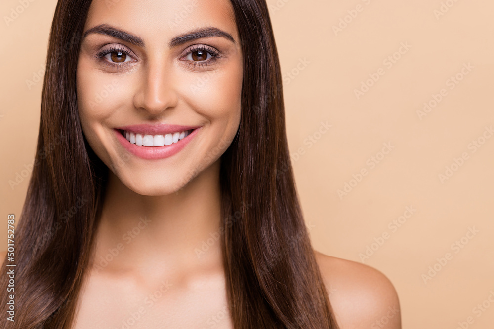 Cropped photo of attractive lady look in camera toothy smiling empty space isolated pastel color background Cropped photo of attractive lady look in camera toothy smiling empty space isolated pastel color background
