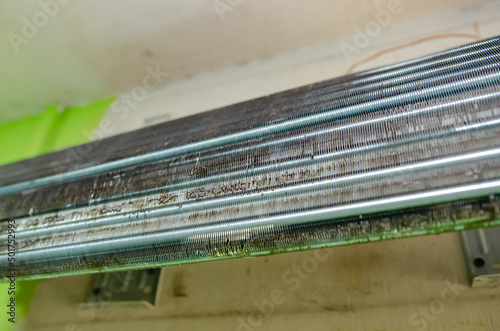 Air conditioner evaporator that is dirty from dust, try in the air, soft focus image.