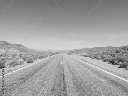 Desolate Highway 266 in Esmeralda County, Nevada. A remote desert road seemingly in the middle of nowhere. 