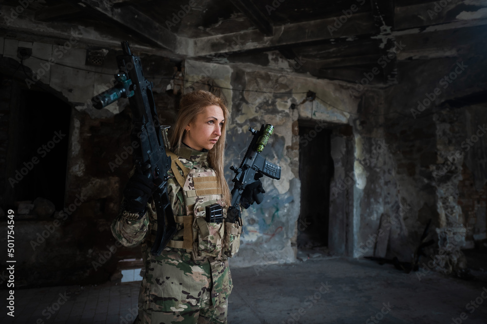 Caucasian military woman in a destroyed building. 