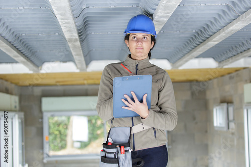 an engineer woman with clipboard