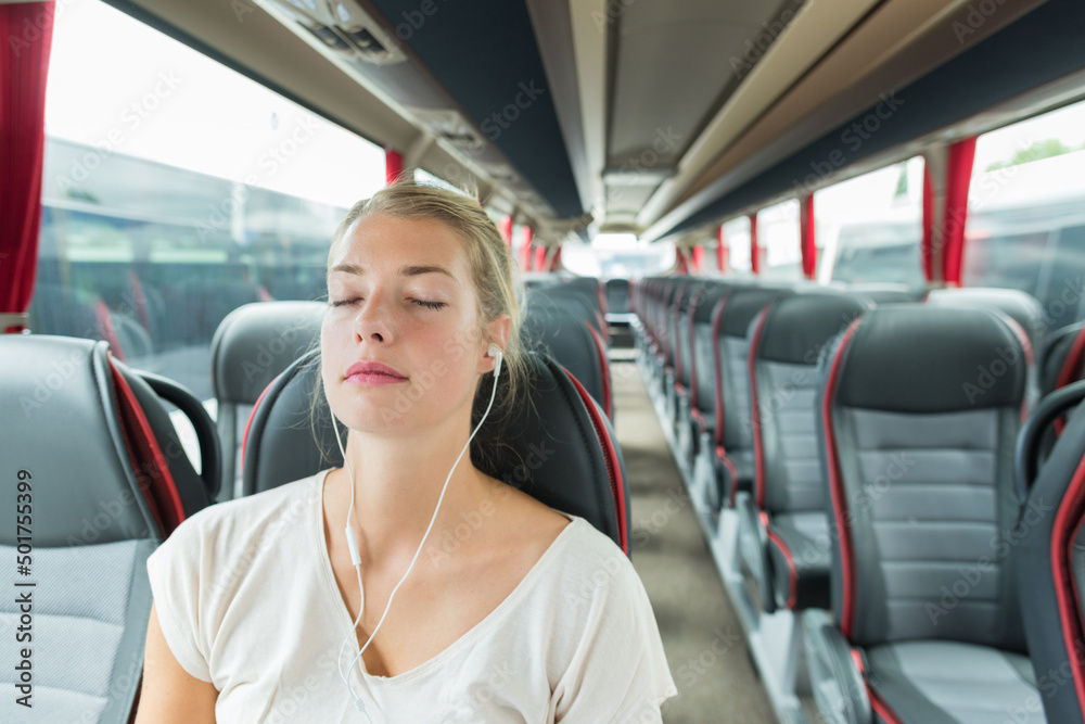 young beautiful woman sleeping in the bus young beautiful woman sleeping in the bus