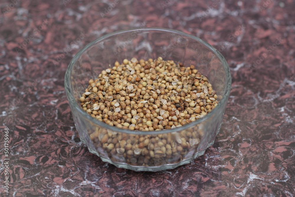 Coriander seeds decorated in a glass bowl Coriander seeds decorated in a glass bowl