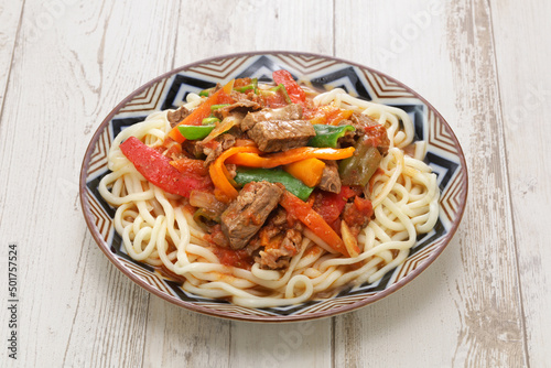 Laghman, hand pulled noodles dish with lamb meat and vegetables, Uyghur cuisine
