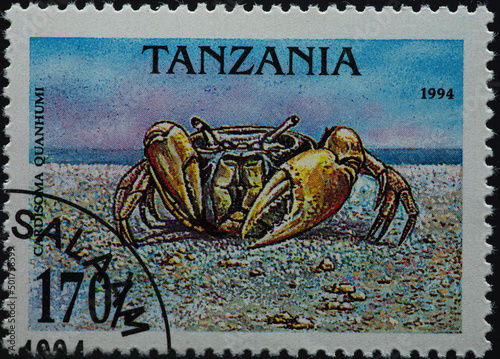 TANZANIA - CIRCA 1994: a postage stamp from TANZANIA, showing a Blue Land Crab (Cardisoma guanhumi). Circa 1994 photo