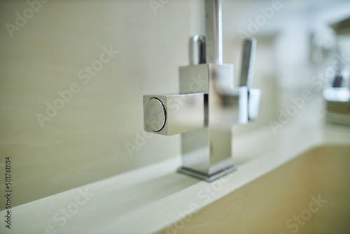 Vászonkép chrome faucet in the kitchen close-up. Faucet close up.